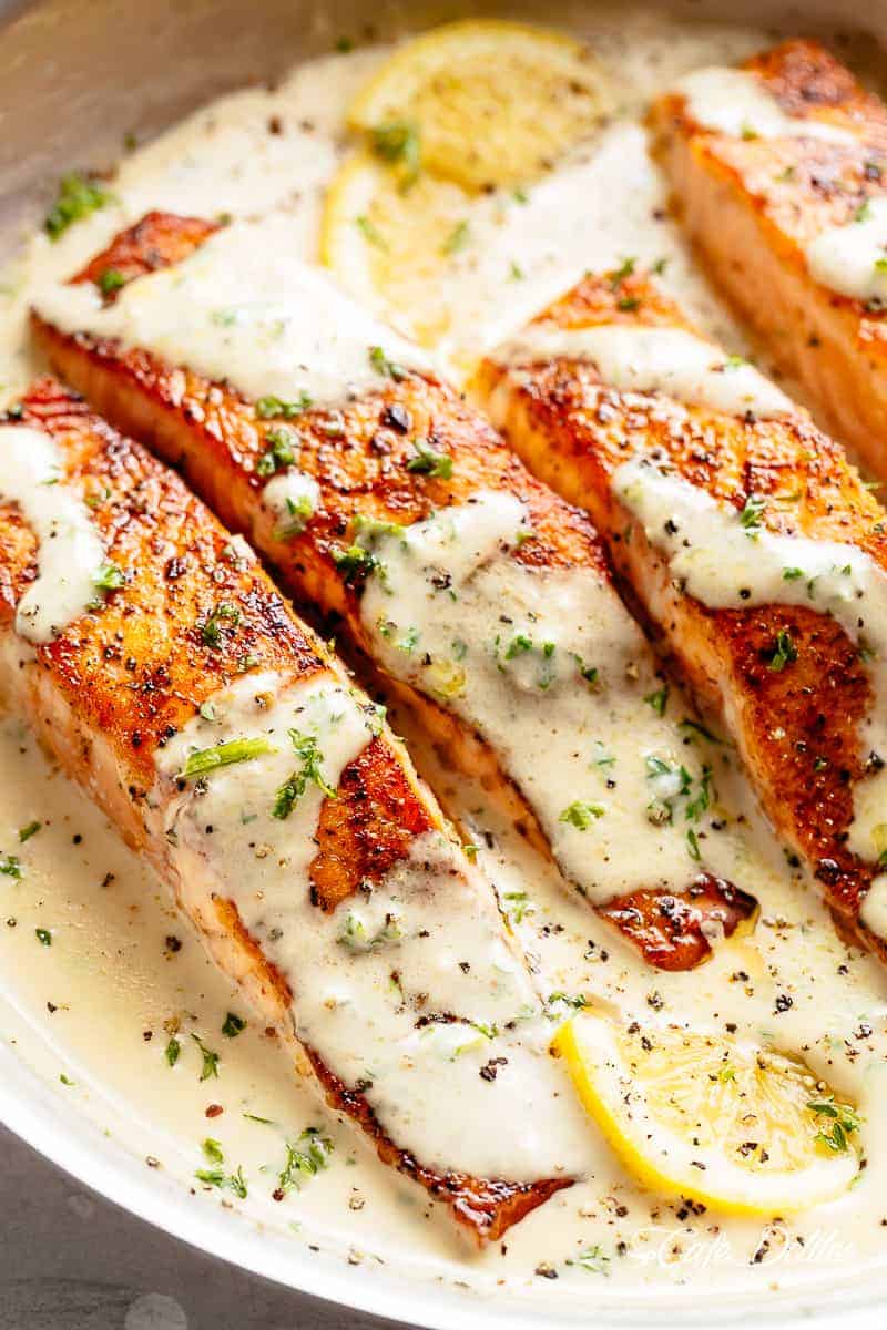 Warm salmon in a bowl with lemons and garlic