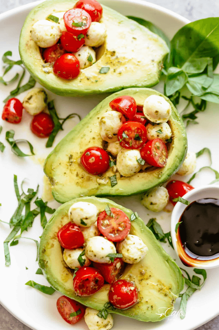 Caprese Stuffed Avocados with cherry tomatoes