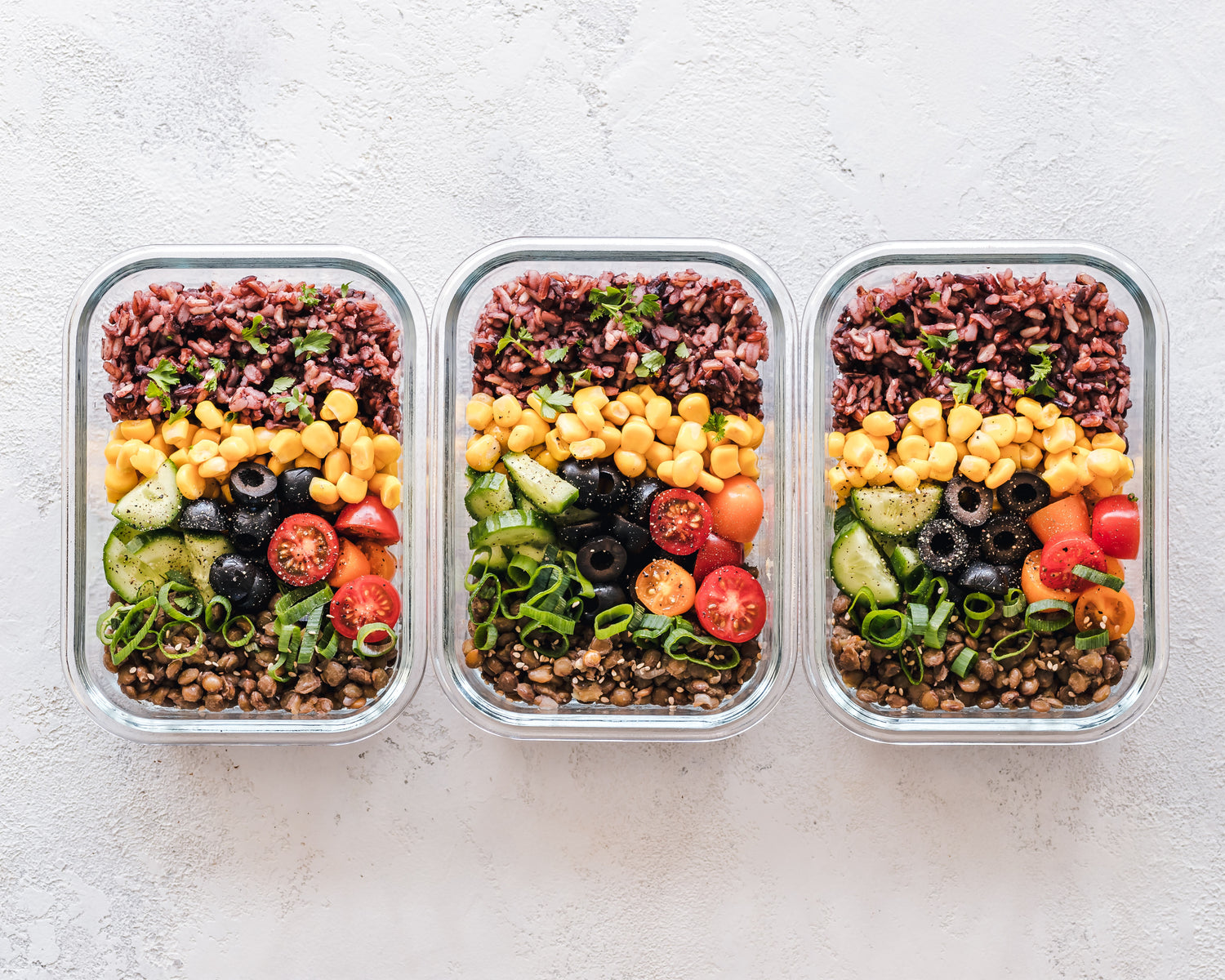 Three meal prep dishes in a row