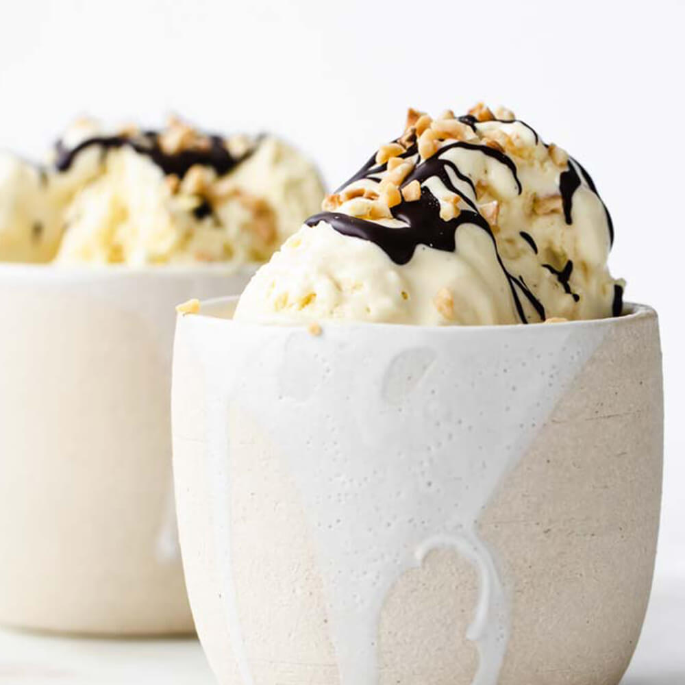 Sugar Free Ice Cream topped with nuts and sugar free chocolate