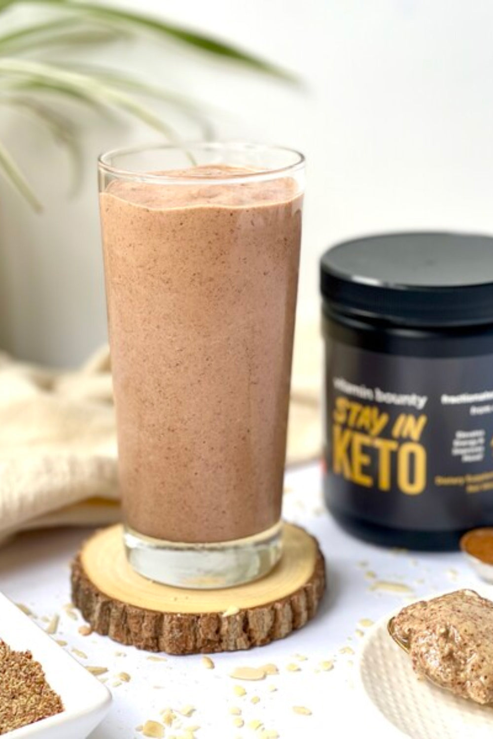 Stay in keto Almond Butter Cinnamon Smoothie, pictured in a tall glass