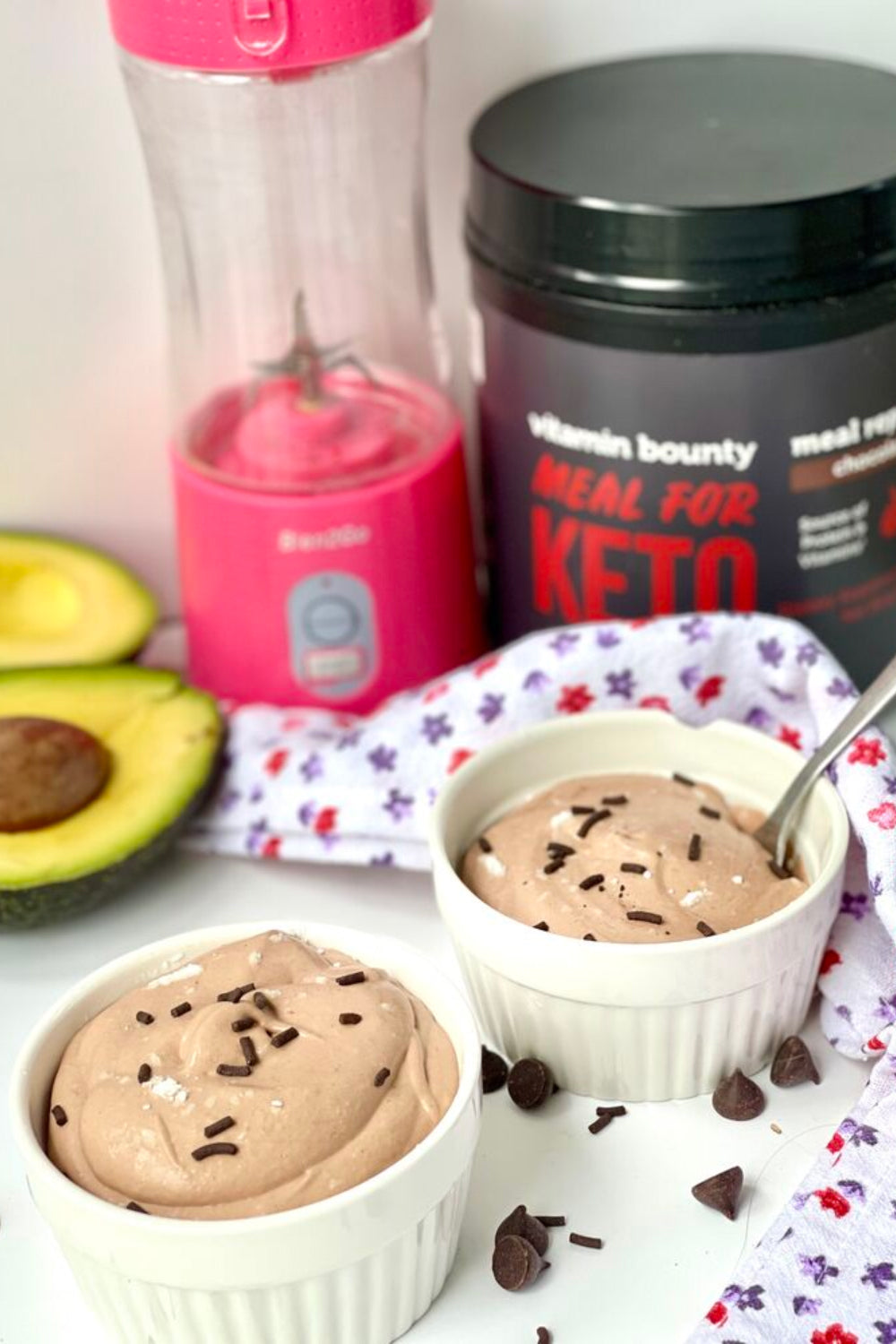 Meal For Keto Avocado Chocolate Mousse pictured in ceramic jars 