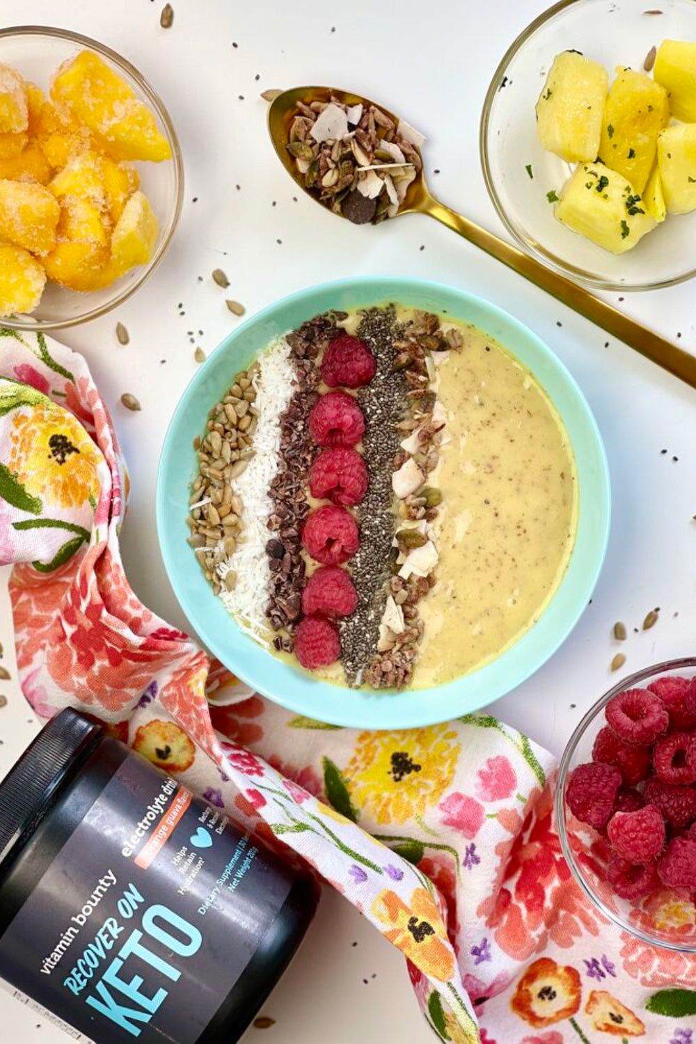 Mango Pineapple Smoothie Bowl made with Vitamin Bounty's Recover On Keto 