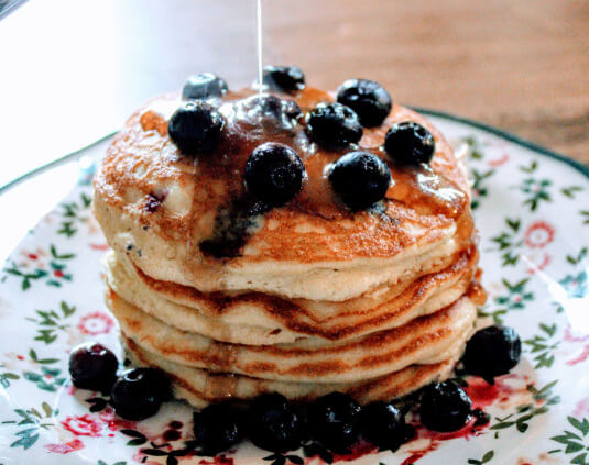 Fluffy Low-Carb Pancakes topped with blueberries